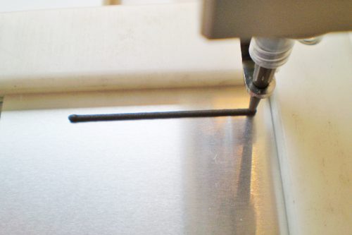 メイン画像：接着剤塗布（FIPG、CIPG）加工